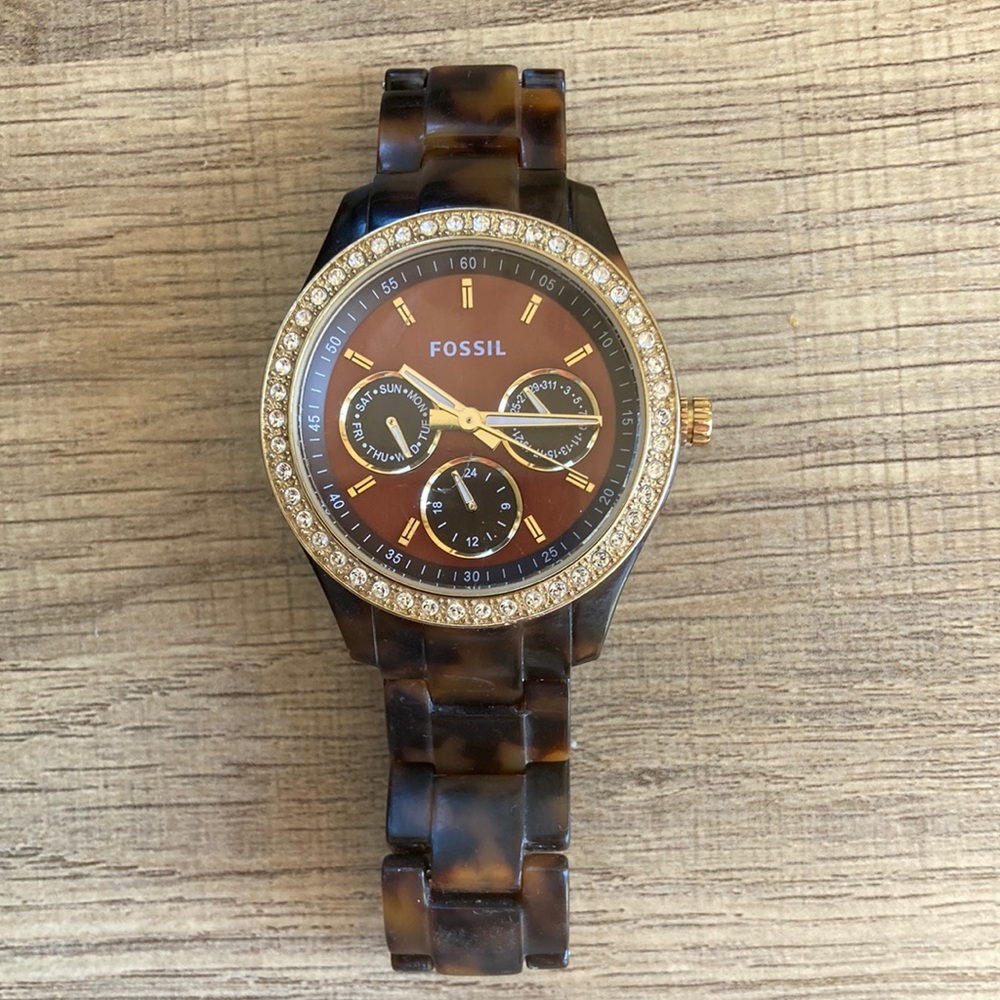 Fossil women’s tortoise shell watch with crystal embedded rim